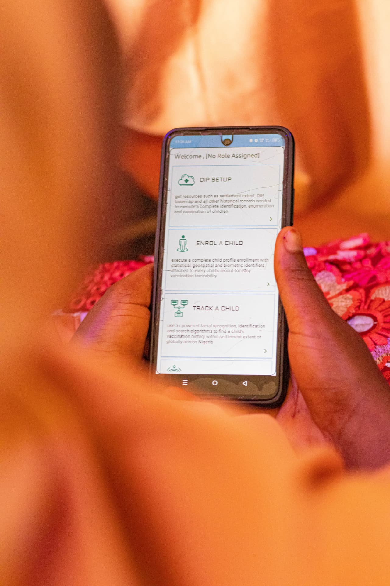 The C-Tracka child enrolment and tracking options displayed on a mobile phone